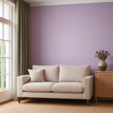 Statement wall in colour Thistle styled in a modern living room. 